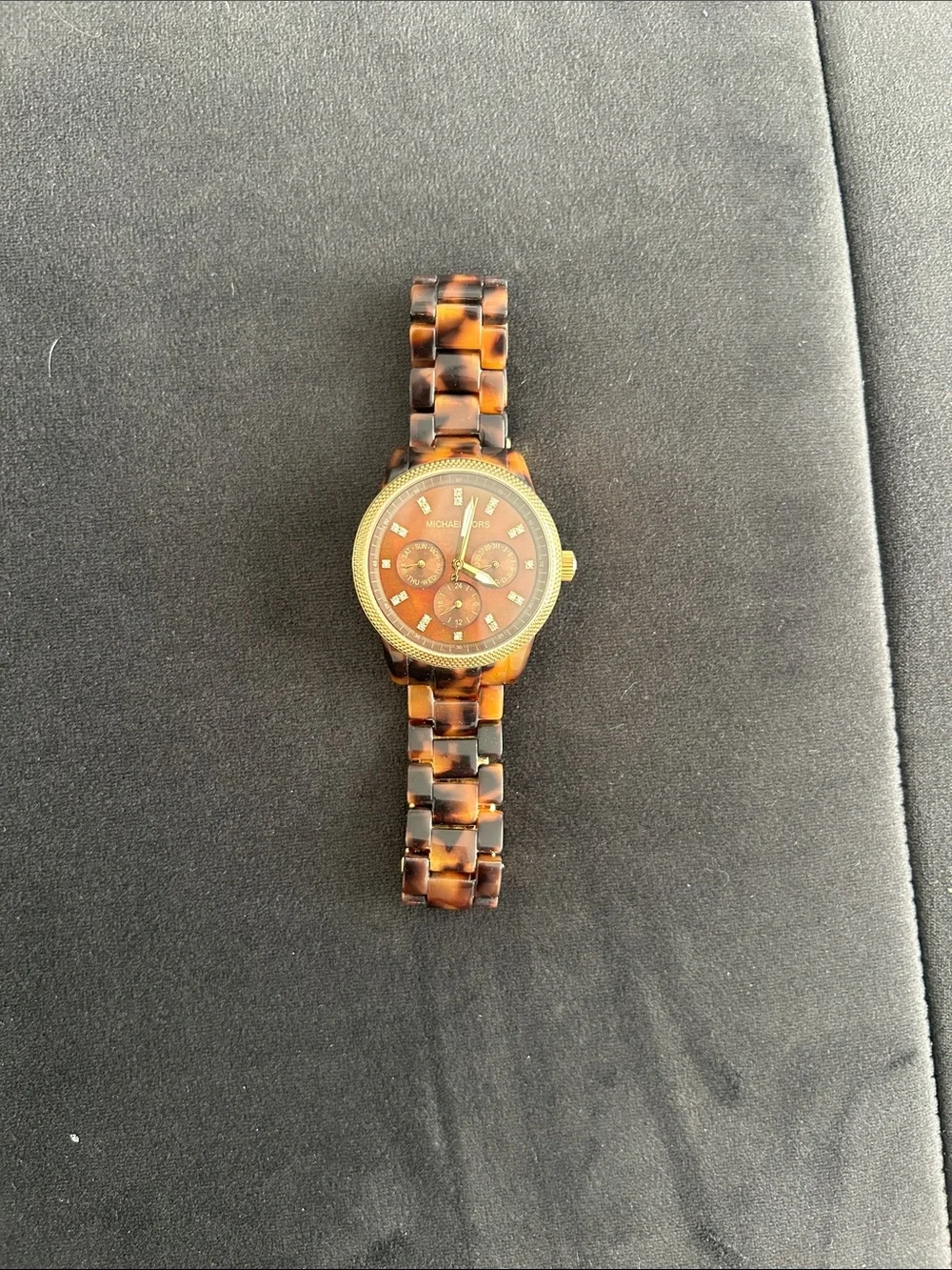 Michael Kors tortoise shell watch. Battery replacement required.
